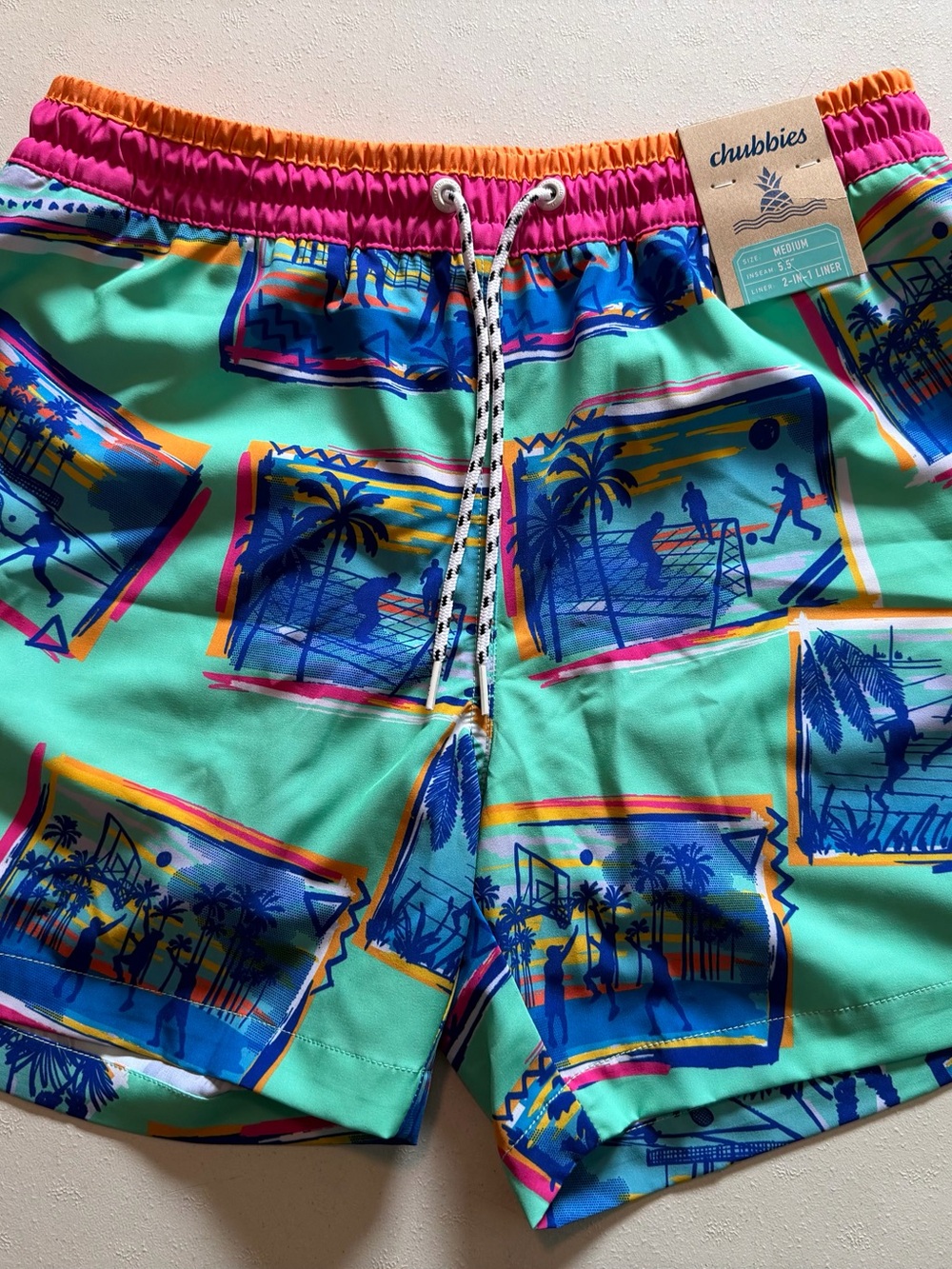chubbies Mint Tropical Print Swim Shorts with Pink and Orange Waistband